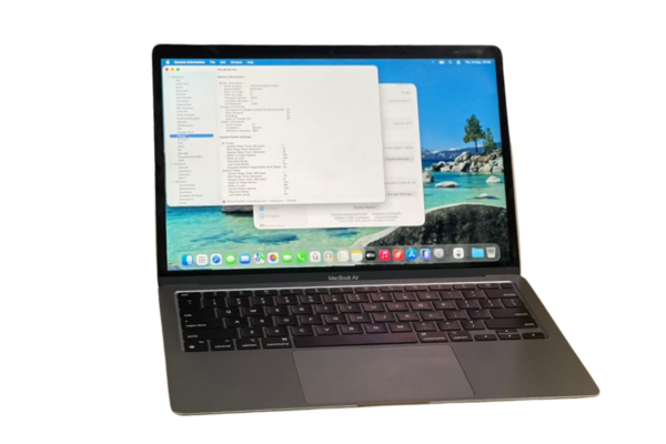 Space Gray MacBook Air showing System Information on screen at Mudde AI Kampala